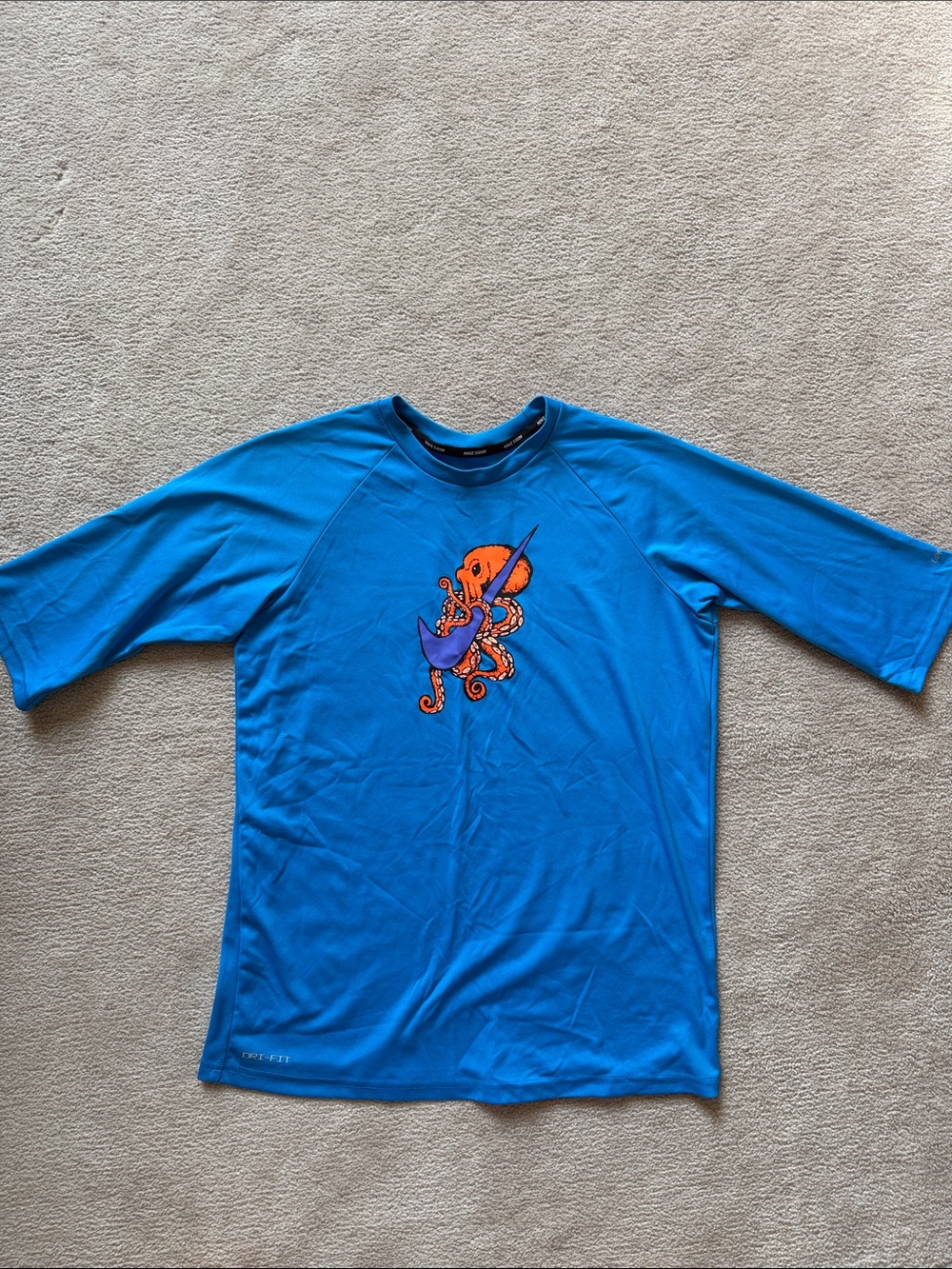 Nike Kids Blue Rashguard with Orange Octopus Graphic